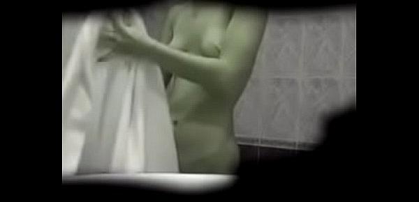  Young woman spy shower
